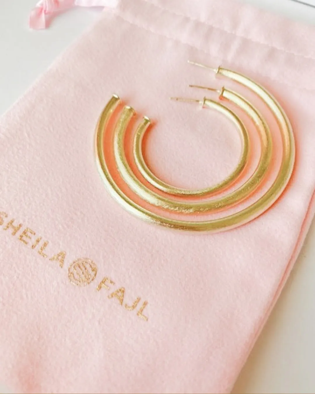 Everybody's Favorite Hoop in gold by Sheila Fajl